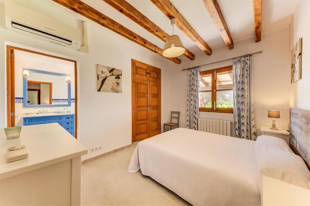 Postel nebo postele na pokoji v ubytování Villa Lidia by Sealand Villas