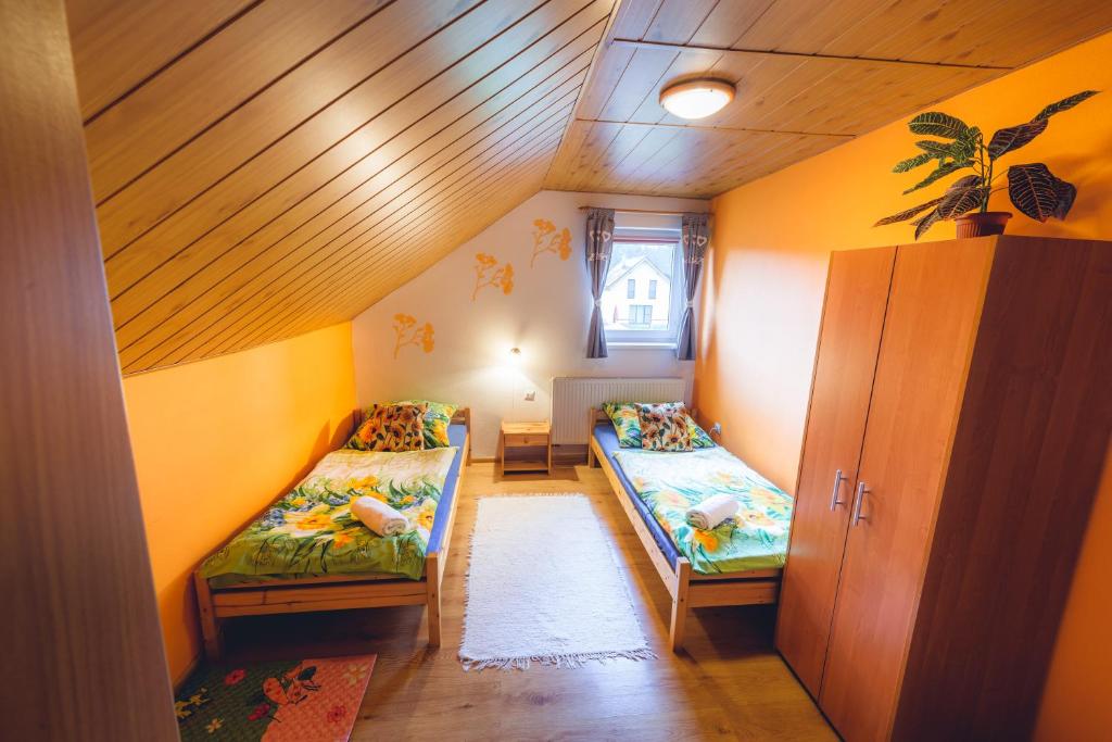 Postel nebo postele na pokoji v ubytování Apartmán u Paťka Zuberec