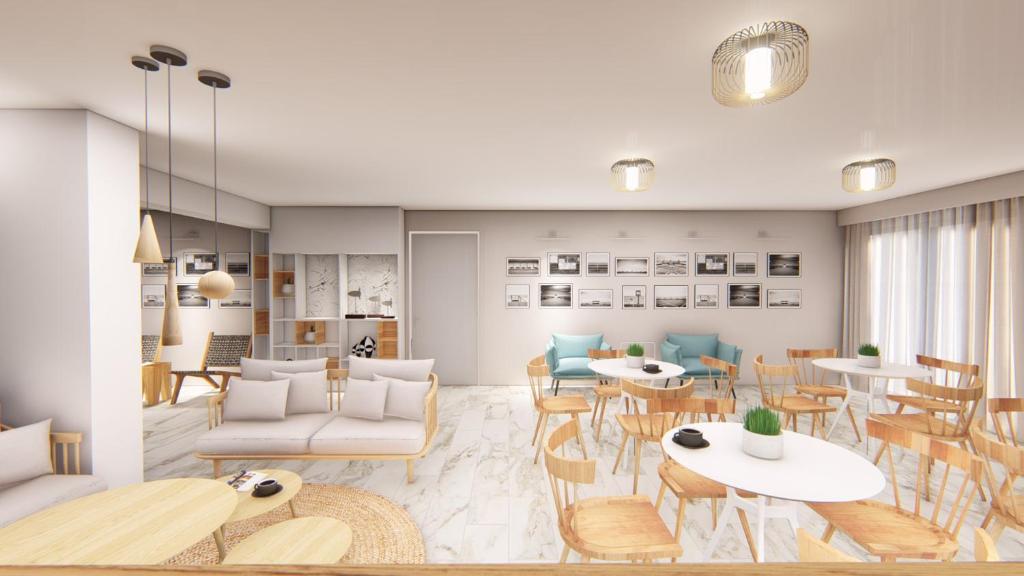 a rendering of a living room with tables and chairs at Hotel Grand Nefeli in Vasiliki