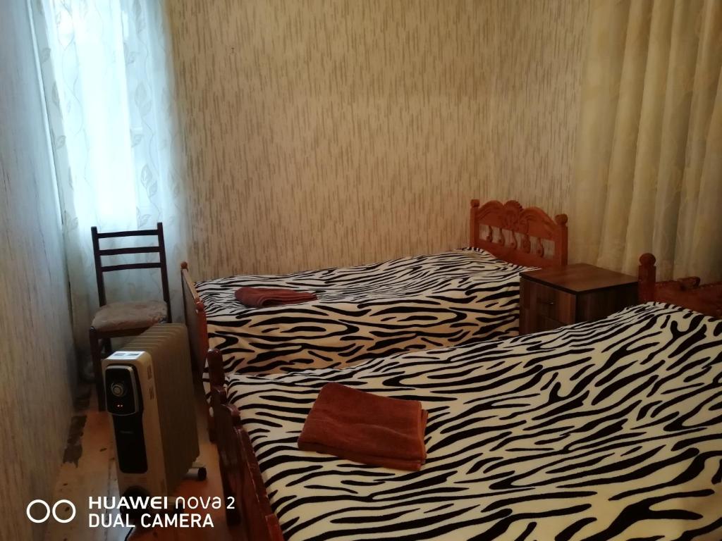 Postel nebo postele na pokoji v ubytování Nora's guesthouse