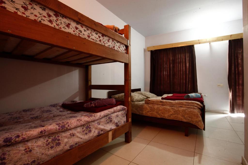 Llit o llits en una habitació de Vaso-Levani House
