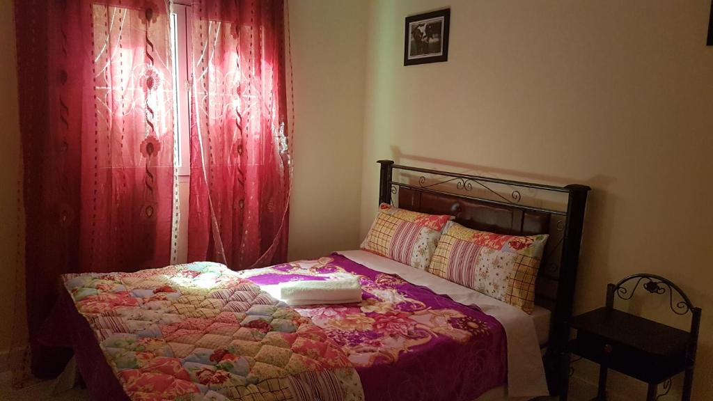 Postel nebo postele na pokoji v ubytování Hotel Nice 06