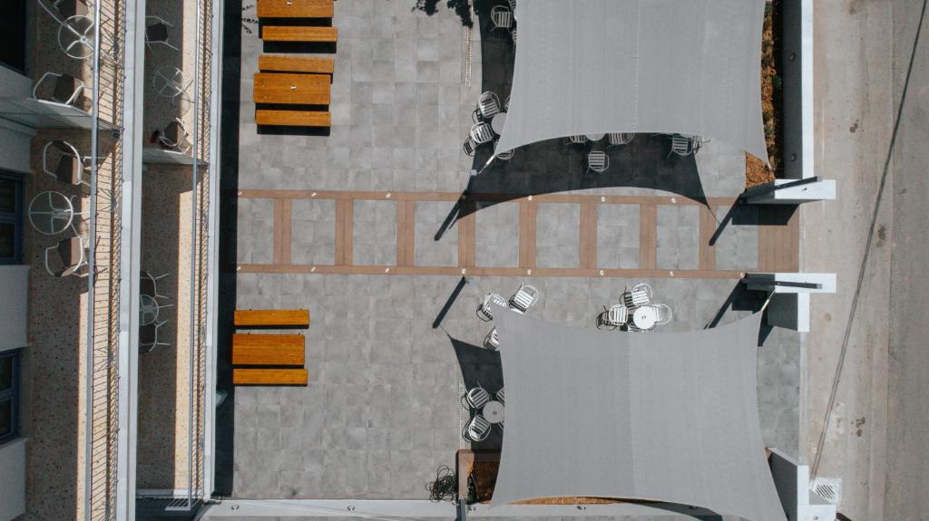 an aerial view of a building with people standing on it at Vivari Acta in Vivari