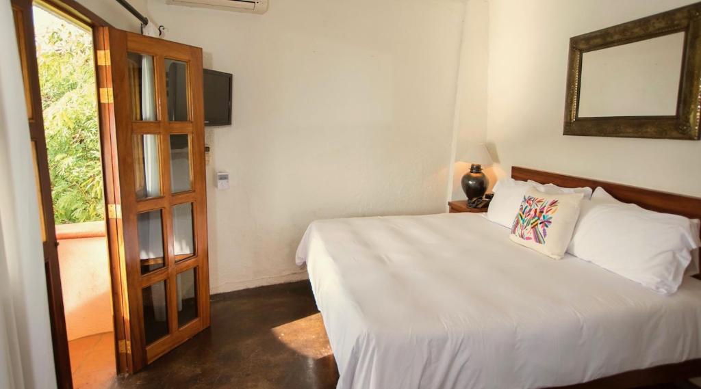 Villas Carrizalillo - Suite Met Kingsize Bed En Balkon