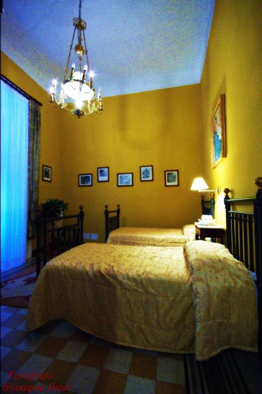 Postel nebo postele na pokoji v ubytování B&B Casa Cavalli