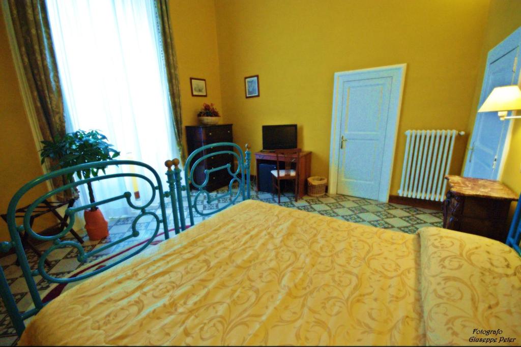 Postel nebo postele na pokoji v ubytování B&B Casa Cavalli