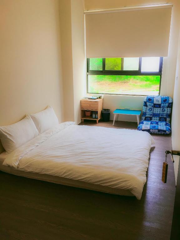 Postel nebo postele na pokoji v ubytování Aegean Sea Homestay