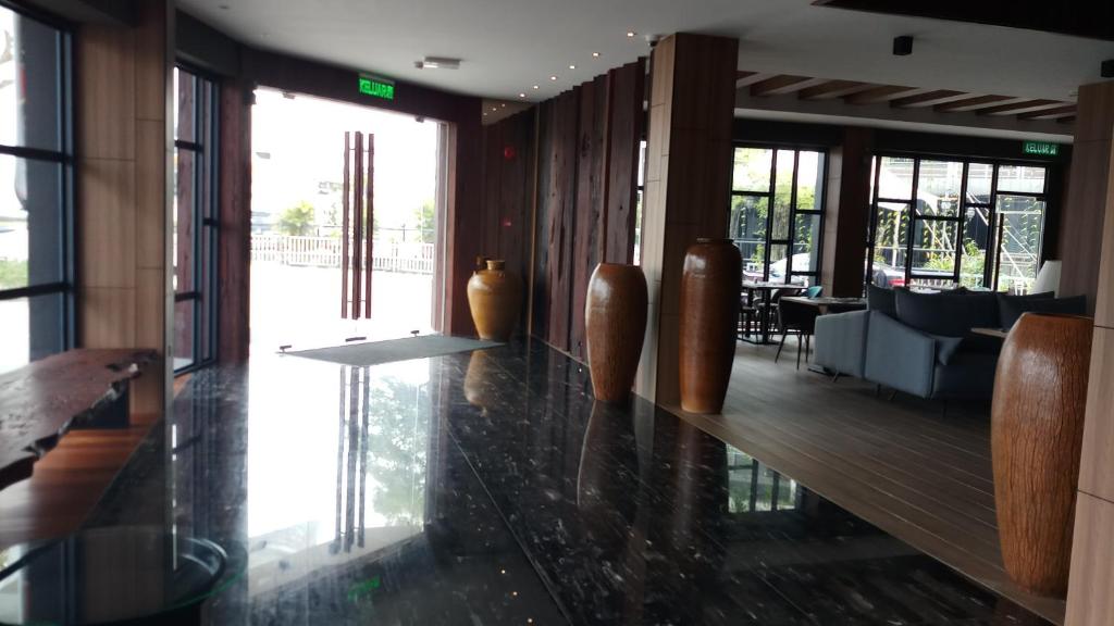 Posezení v ubytování Roxy Hotel Padungan