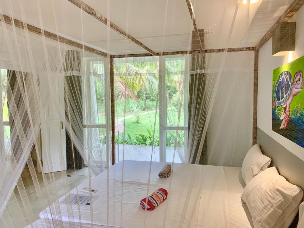 Postel nebo postele na pokoji v ubytování Good Vibes Villas