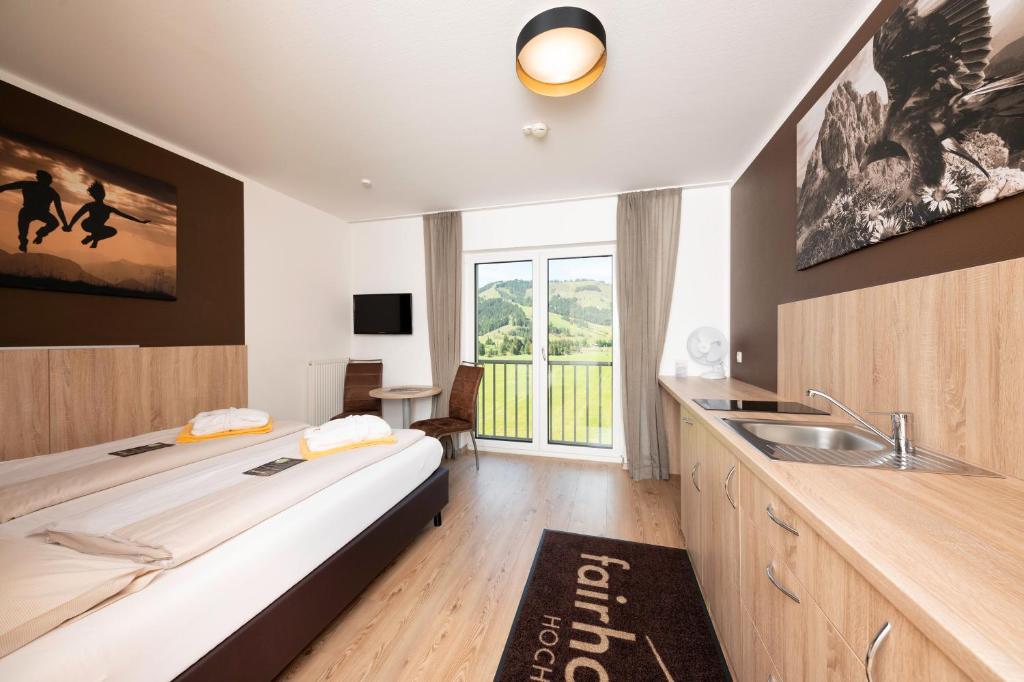 Postel nebo postele na pokoji v ubytování Fairhotel Hochfilzen B&B