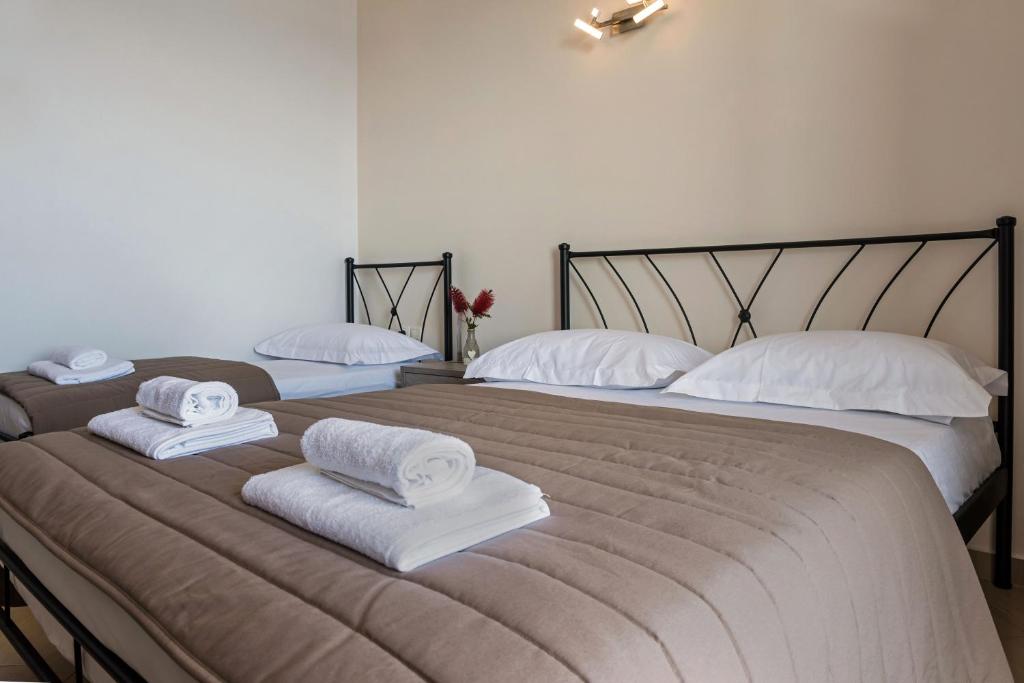 Voodi või voodid majutusasutuse Anesis Hotel toas