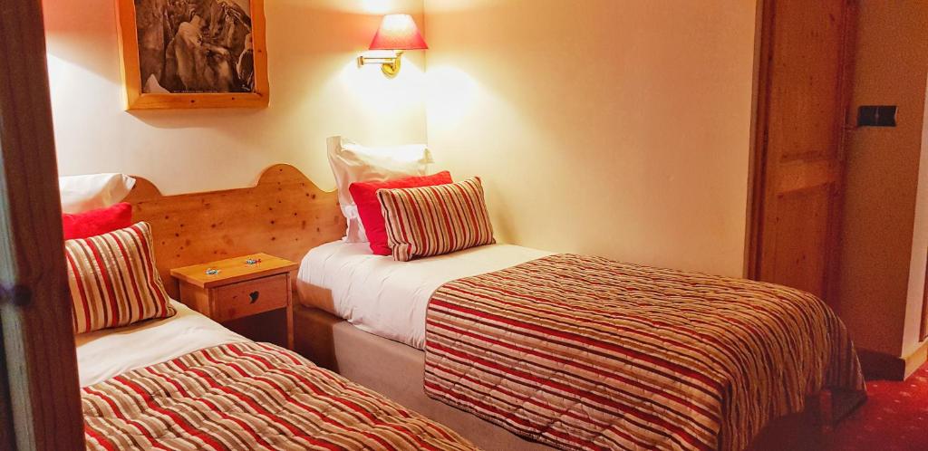 Postel nebo postele na pokoji v ubytování Park Hotel Suisse & Spa