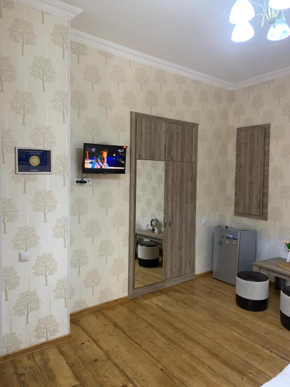 TV a/nebo společenská místnost v ubytování Guest House Rafael