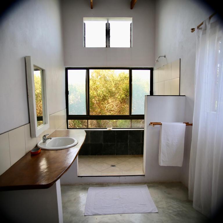 Koupelna v ubytování Tree House Villa