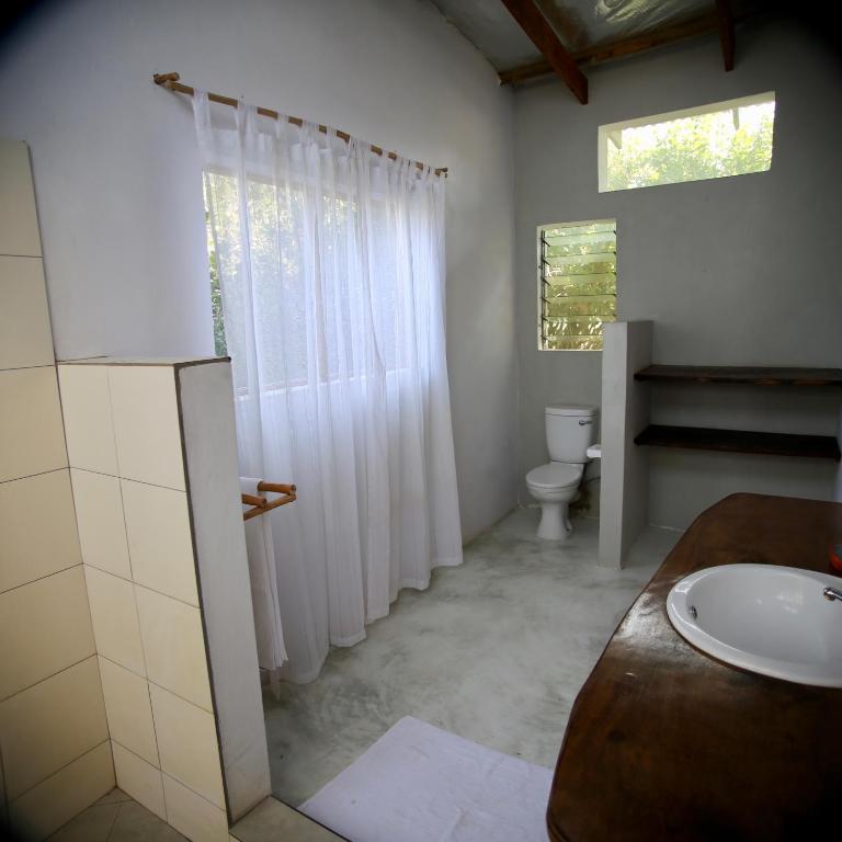 Koupelna v ubytování Tree House Villa