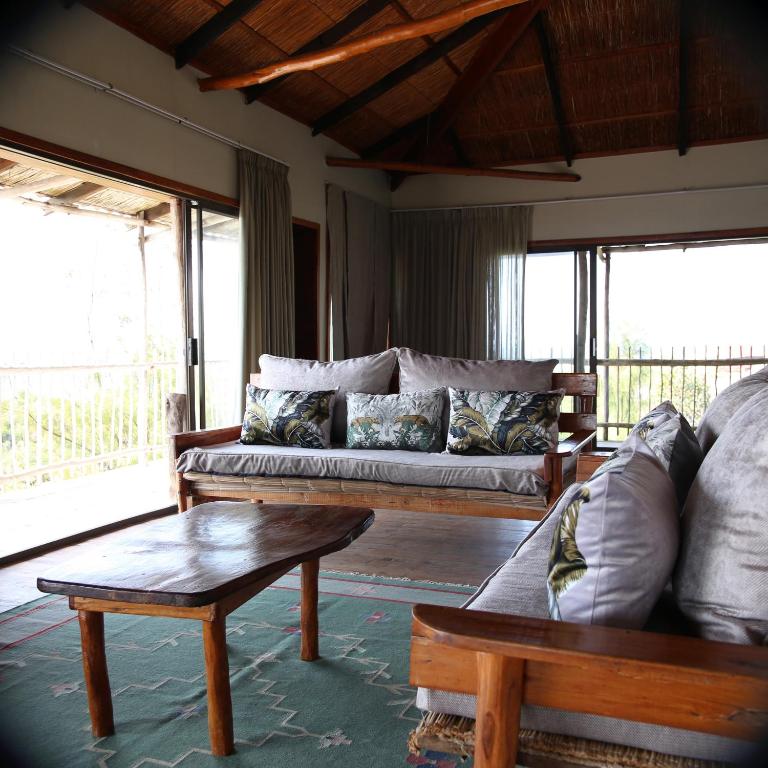 Posezení v ubytování Tree House Villa