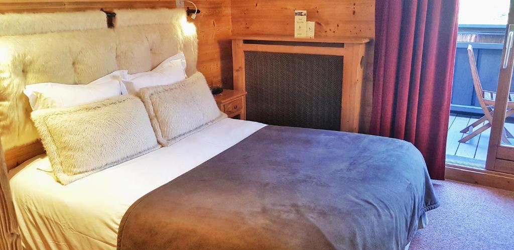 Postel nebo postele na pokoji v ubytování Park Hotel Suisse & Spa