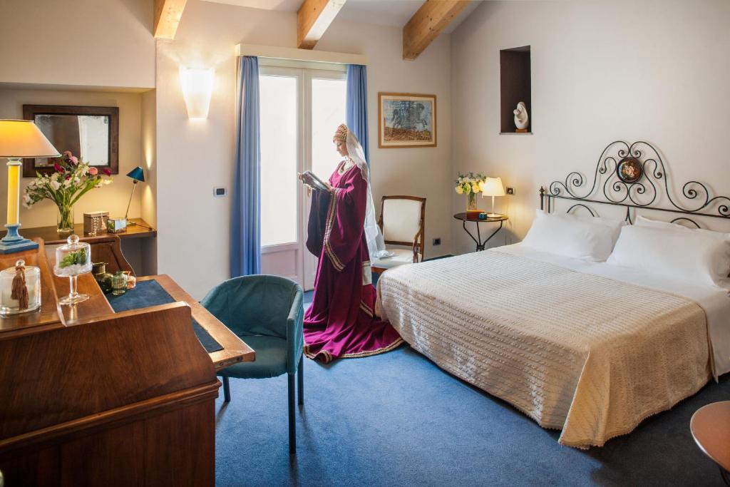 Postel nebo postele na pokoji v ubytování Phi Hotel Palio