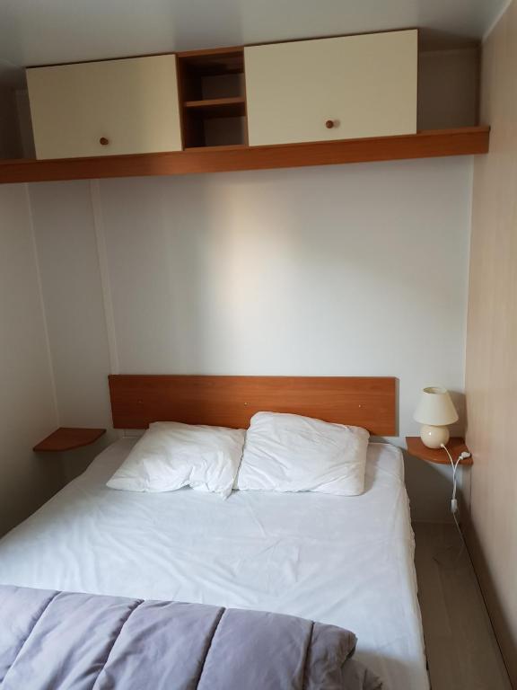 Postel nebo postele na pokoji v ubytování Camping le Moulin du Roy