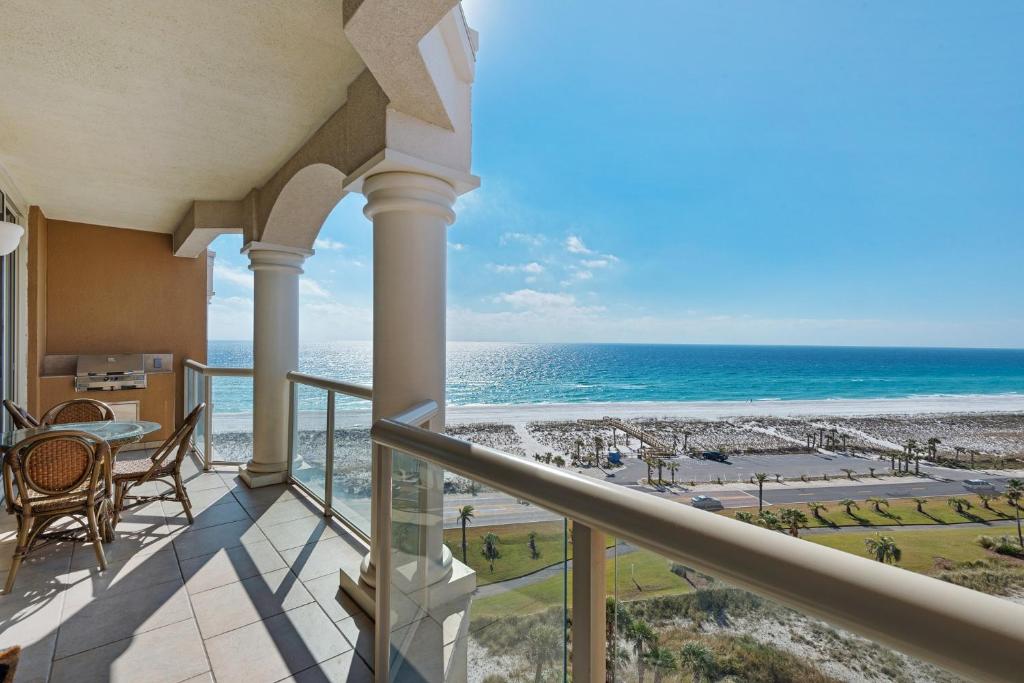 a balcony with a view of the beach at Portofino Tower 1-903 Beachfront Sunset Views in Pensacola Beach