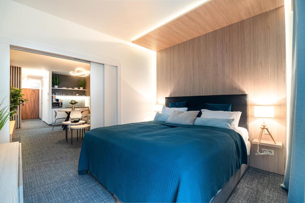 Posteľ alebo postele v izbe v ubytovaní Apartman Pod Hrebienkom - C218