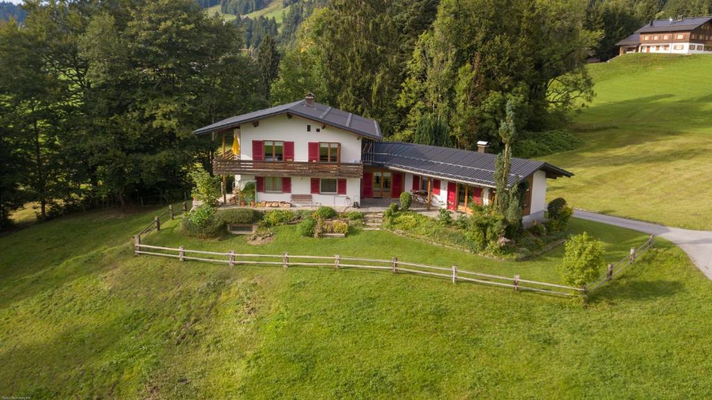 an aerial view of a house on a hill at Haus Kipfen in Sibratsgfäll