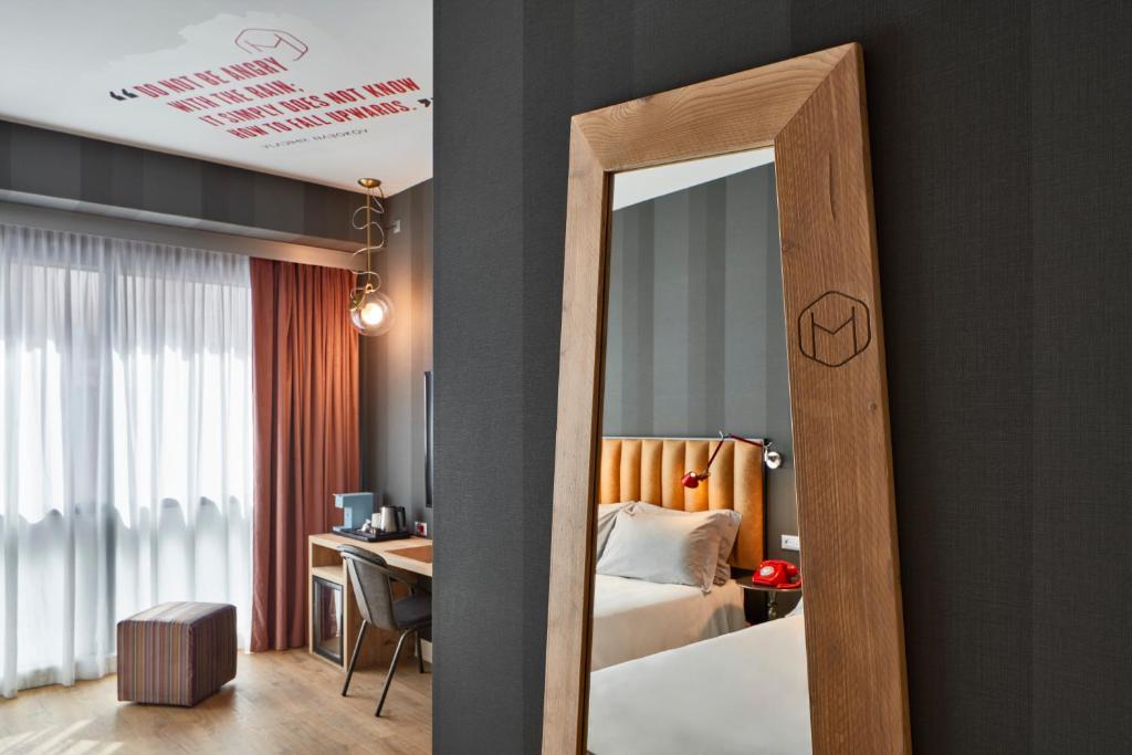 Postel nebo postele na pokoji v ubytování The Modernist Hotel