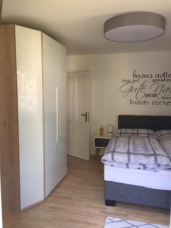 Posteľ alebo postele v izbe v ubytovaní AAA FeWo Bad Hofgastein