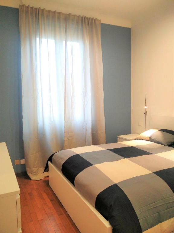 A bed or beds in a room at Carlos BCS2 - Sanremo Center Suite -