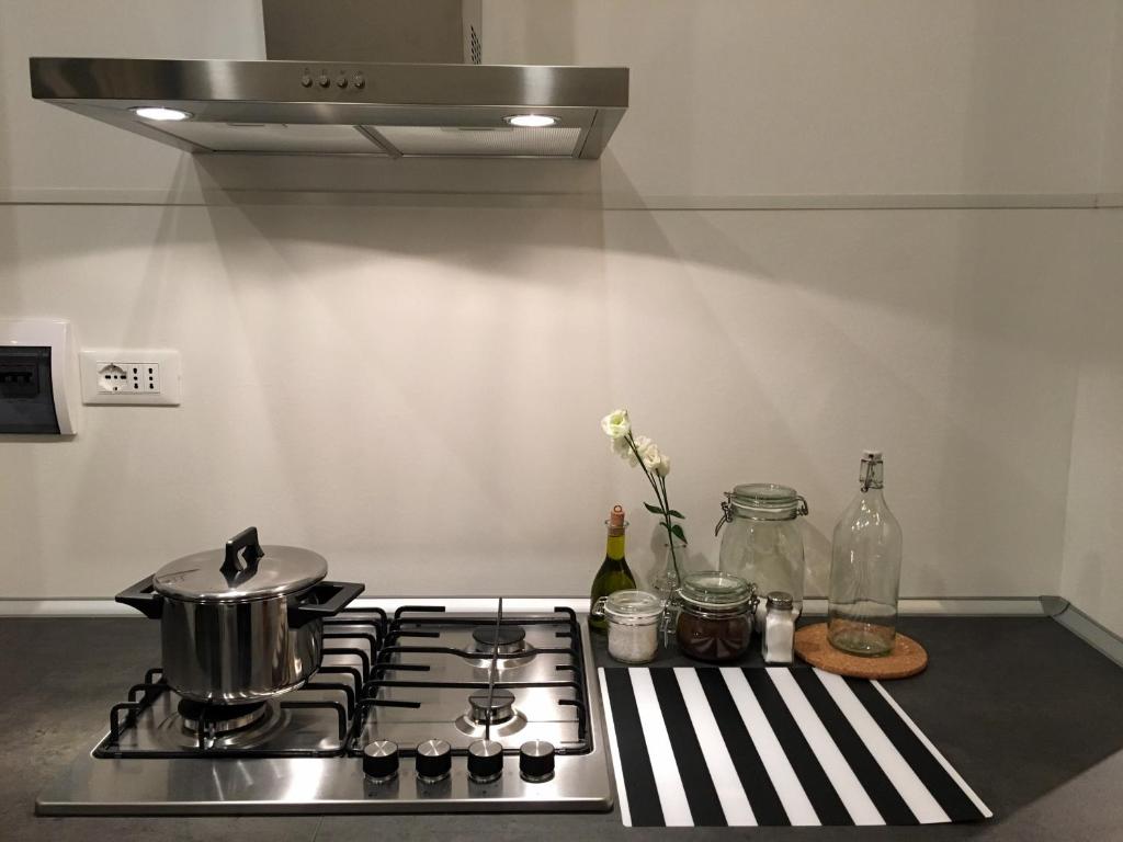 A kitchen or kitchenette at Carlos BCS2 - Sanremo Center Suite -