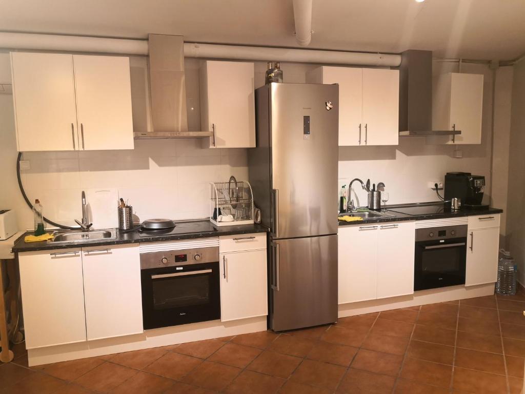 Dapur atau dapur kecil di Barcelona Village Homestay