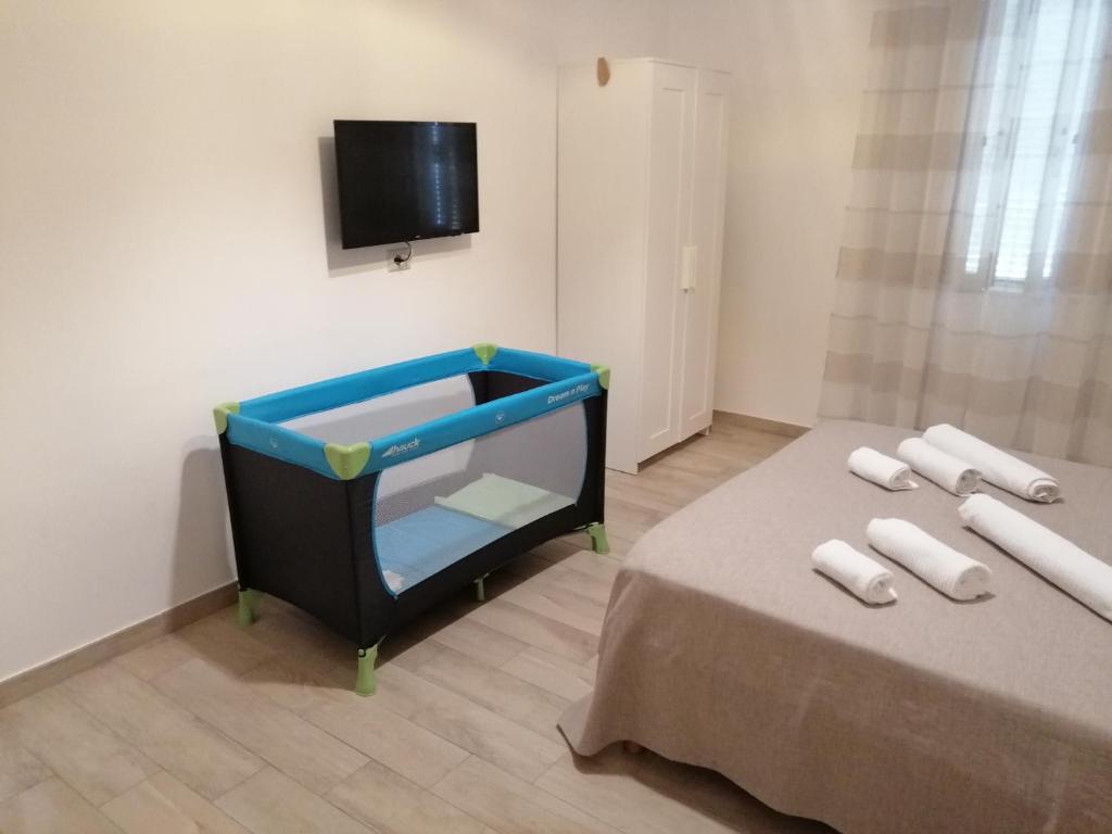 Postel nebo postele na pokoji v ubytování Suite Contè