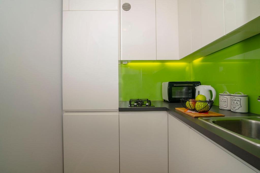 Kuchyňa alebo kuchynka v ubytovaní WLR Apartments - Hoza II