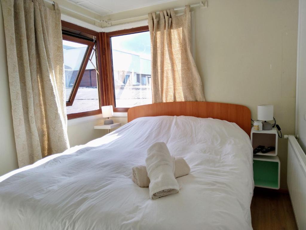 Postel nebo postele na pokoji v ubytování Patagon Backpackers
