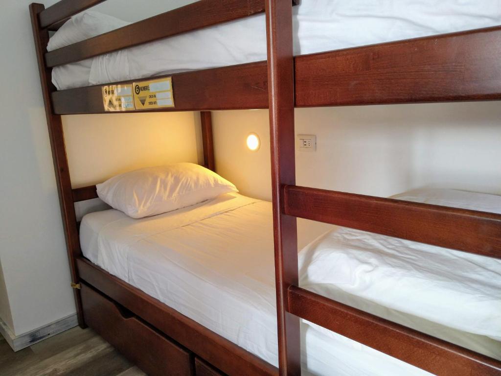 Postel nebo postele na pokoji v ubytování Patagon Backpackers