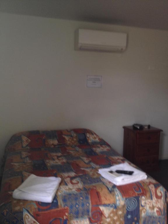 Postel nebo postele na pokoji v ubytování Blackwater Hotel Motel