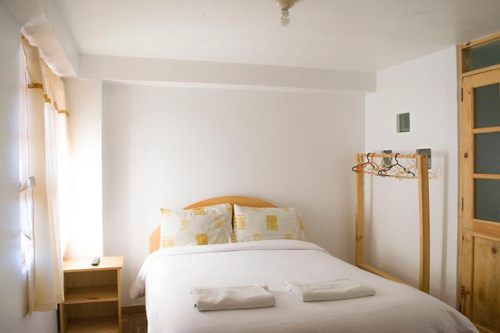 Postel nebo postele na pokoji v ubytování Casa Don Jose B & B