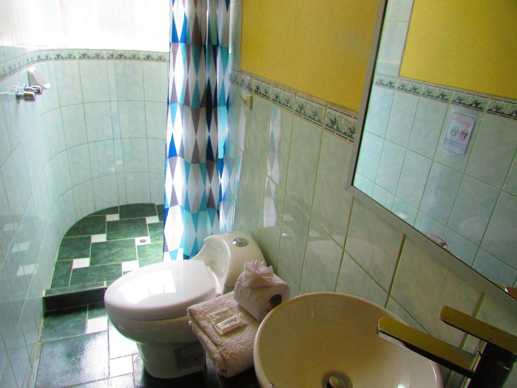 Koupelna v ubytování Maya Inn