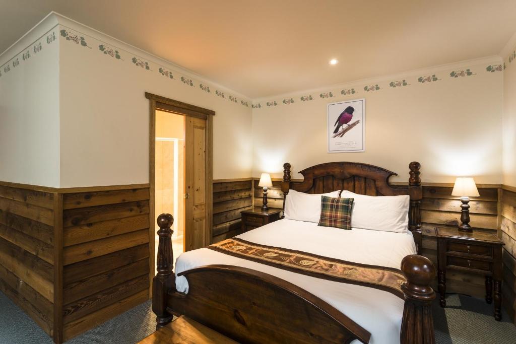 Postel nebo postele na pokoji v ubytování Cradle forest inn