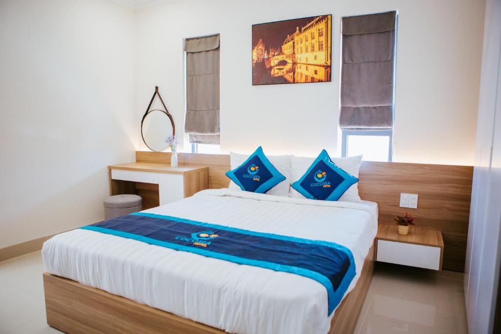 Postel nebo postele na pokoji v ubytování COCOSEA HOTEL