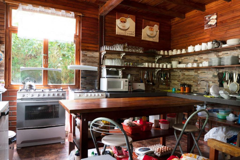 Kjøkken eller kjøkkenkrok på Mindo Green House