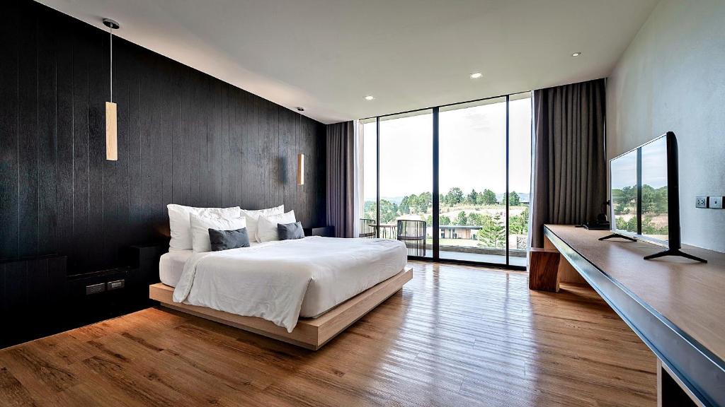 Postel nebo postele na pokoji v ubytování De Capoc Resort