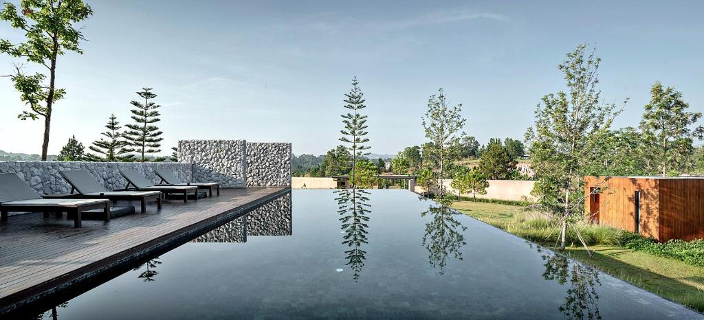 Bazén v ubytování De Capoc Resort nebo v jeho okolí