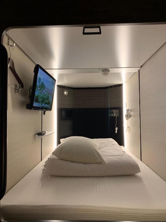 Postel nebo postele na pokoji v ubytování Matsue Urban Hotel CubicRoom