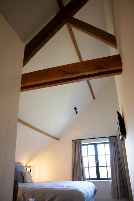 Postel nebo postele na pokoji v ubytování Madelette B&B