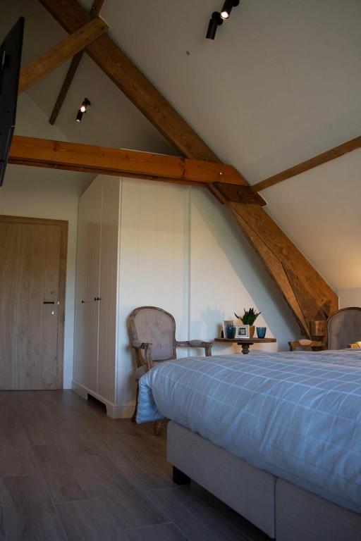 Postel nebo postele na pokoji v ubytování Madelette B&B