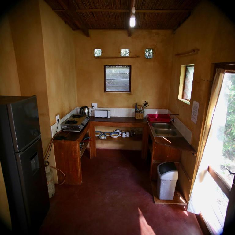 Kuchyň nebo kuchyňský kout v ubytování Tree House Cottage, Ocean View