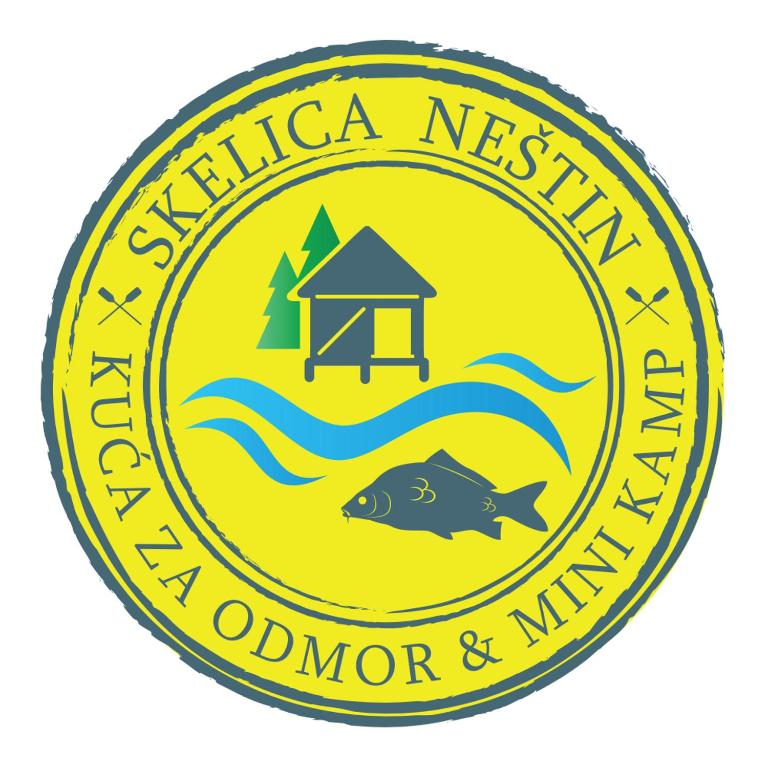 a yellow emblem with a fish in the water at House&mini-Camp SKELICA in Neštin