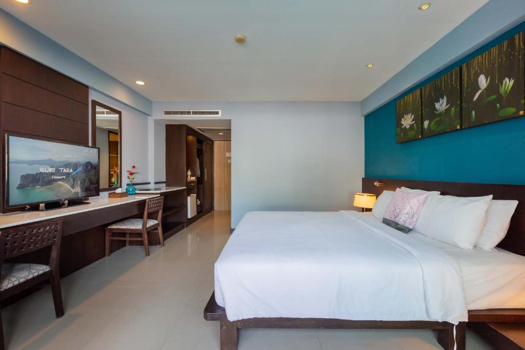 Postel nebo postele na pokoji v ubytování Blue Tara Hotel Krabi Ao Nang