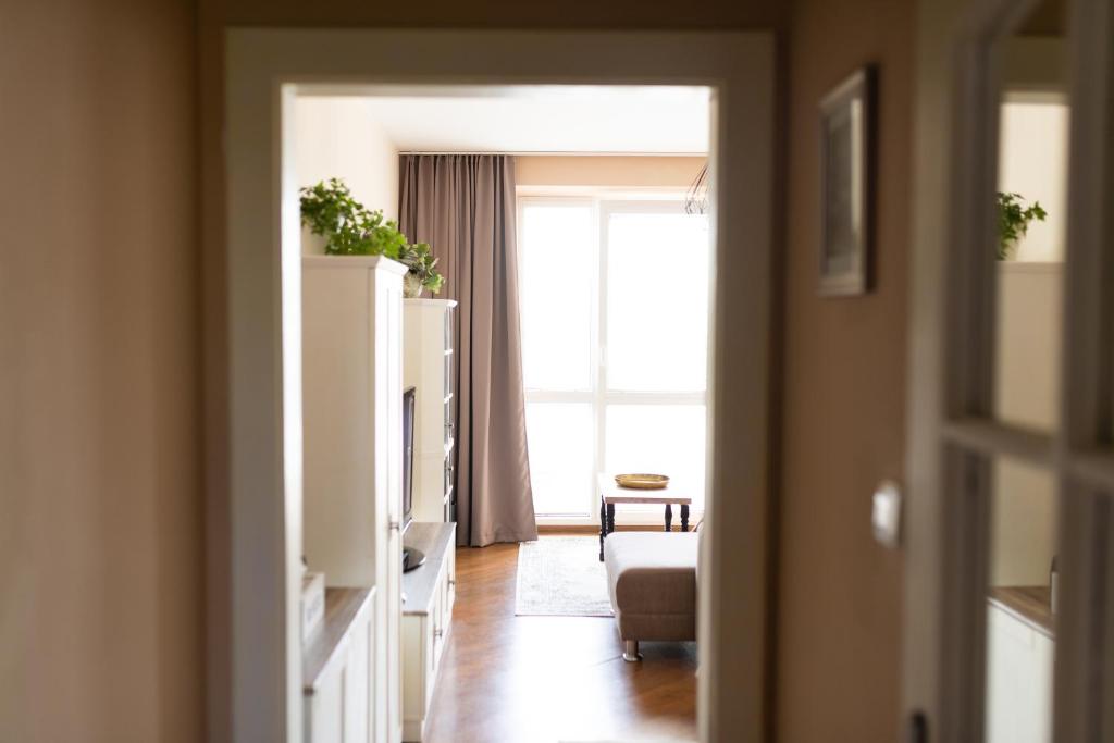 Televízia a/alebo spoločenská miestnosť v ubytovaní Old Town Vintage Apartment Sturova